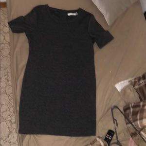 Grey thigh length dress from the brand Magazine.